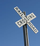 Photo of a railroad crossing.